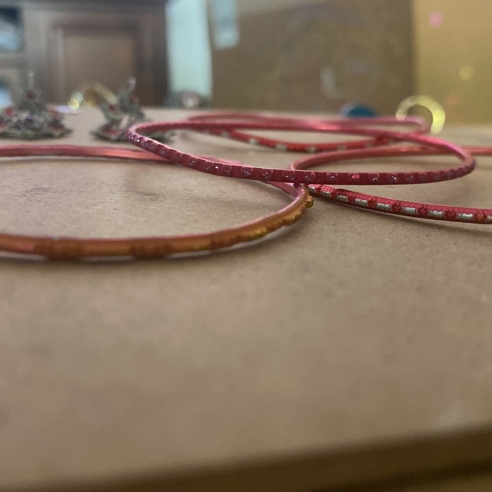 Read Earrings And Four Bangle Bracelets Pretty De… - image 2